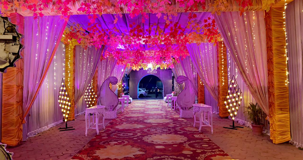 Illuminated floral entrance at Swagat Palace